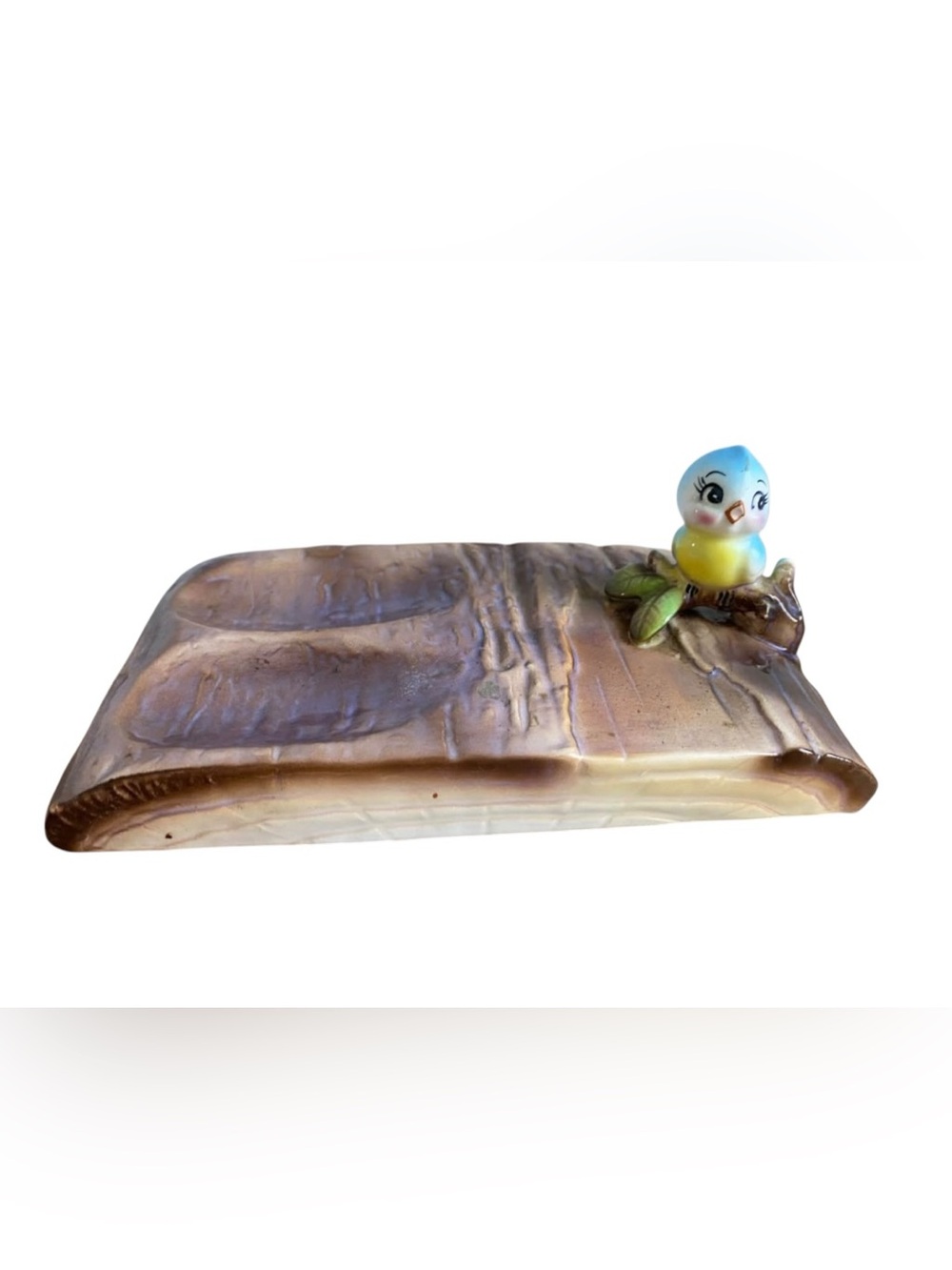 Extremely rare Norcrest bluebird on log spoon rest